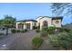 Attractive home with a well-kept lawn, desert landscaping and two-car garage at 5243 E Windstone Trl, Cave Creek, AZ 85331
