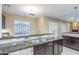 Gourmet kitchen features granite countertops, stainless steel appliances, and ample cabinet space at 5243 E Windstone Trl, Cave Creek, AZ 85331