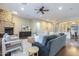 Cozy living room with stone fireplace and views to dining area, perfect for entertaining at 5243 E Windstone Trl, Cave Creek, AZ 85331