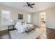 Spacious main bedroom with ensuite bathroom, wood floors, neutral decor, and lots of light at 5243 E Windstone Trl, Cave Creek, AZ 85331