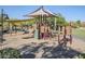 Shaded community playground offers fun for all ages at 5243 E Windstone Trl, Cave Creek, AZ 85331