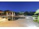 Serene backyard pool with rock waterfall feature and gazebo for relaxed outdoor living at 5243 E Windstone Trl, Cave Creek, AZ 85331
