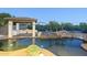 Backyard swimming pool with gazebo, rock features, and built-in outdoor kitchen at 5243 E Windstone Trl, Cave Creek, AZ 85331