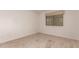 Bedroom features neutral carpet, white walls, and a window at 5312 S Hazelton Ln, Tempe, AZ 85283