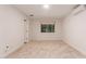 Bedroom with neutral carpet, one window, and white walls at 5312 S Hazelton Ln, Tempe, AZ 85283