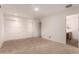 Bedroom boasts neutral carpet, three white closets, and an ensuite bathroom at 5312 S Hazelton Ln, Tempe, AZ 85283