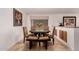 Cozy dining area featuring a round table, upholstered chairs, and view to outdoors at 5312 S Hazelton Ln, Tempe, AZ 85283