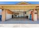 Large garage with washer, dryer, storage cabinets, and ladders at 5312 S Hazelton Ln, Tempe, AZ 85283
