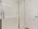Walk in shower with glass door and white tile surround at 5312 S Hazelton Ln, Tempe, AZ 85283
