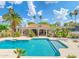 Stunning backyard with a sparkling pool, lush landscaping, and covered patio for outdoor enjoyment at 5540 E Mercer Ln, Scottsdale, AZ 85254