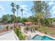 Expansive backyard with a pool, basketball court, gazebo, and lush greenery providing ample space for recreation at 5540 E Mercer Ln, Scottsdale, AZ 85254