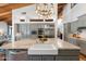 Spacious kitchen featuring a large island with sink, stainless steel appliances, and recessed lighting at 5540 E Mercer Ln, Scottsdale, AZ 85254