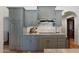 Modern kitchen featuring custom cabinetry, a subway tile backsplash, and stainless steel appliances at 5540 E Mercer Ln, Scottsdale, AZ 85254