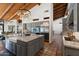 Gourmet kitchen with a large central island, granite countertops, stainless steel appliances at 5540 E Mercer Ln, Scottsdale, AZ 85254