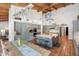 Bright kitchen featuring stainless steel appliances, large island with seating, and decorative lighting at 5540 E Mercer Ln, Scottsdale, AZ 85254