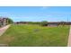 Scenic community green space featuring lush lawns, mature trees, and well-maintained landscaping for neighborhood enjoyment at 5805 W Warner St, Phoenix, AZ 85043