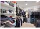 This walk-in closet offers custom shelving and ample storage space for your wardrobe at 5805 W Warner St, Phoenix, AZ 85043