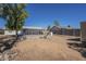 The backyard has a fire pit area and covered patio, great for Gathering gatherings at 643 N 92Nd Pl, Mesa, AZ 85207