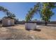 Expansive backyard with a storage shed and plenty of potential for customization at 643 N 92Nd Pl, Mesa, AZ 85207