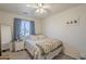 Bright bedroom with a comfortable bed, soft lighting, and neutral decor creates a cozy atmosphere at 643 N 92Nd Pl, Mesa, AZ 85207