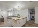 Open concept kitchen flows into the living area, creating a seamless and inviting living space at 643 N 92Nd Pl, Mesa, AZ 85207