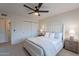 Inviting bedroom with neutral décor, a comfortable bed, and matching nightstands at 656 E Mesquite Ave, Apache Junction, AZ 85119