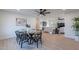 Open floor plan featuring a modern dining area, seamlessly connected to the adjacent living room space at 656 E Mesquite Ave, Apache Junction, AZ 85119