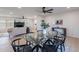 Stylish dining area flowing into the living room, featuring a modern table and contemporary decor at 656 E Mesquite Ave, Apache Junction, AZ 85119