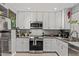 Modern kitchen with stainless steel appliances, sleek countertops, and ample cabinet space for storage at 6739 N 16Th St # 14, Phoenix, AZ 85016