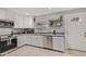 Bright kitchen with stainless steel appliances and tiled floors, perfect for cooking and entertaining guests at 6739 N 16Th St # 14, Phoenix, AZ 85016