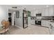 Well-lit kitchen featuring modern appliances and fixtures, seamlessly connecting to the dining area at 6739 N 16Th St # 14, Phoenix, AZ 85016