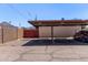 Resident and visitor covered parking area with unit numbers and mountain views at 6739 N 16Th St # 14, Phoenix, AZ 85016