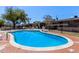 Community swimming pool with bright blue water is perfect for cooling off on hot days at 6739 N 16Th St # 14, Phoenix, AZ 85016