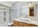 Bathroom vanity with vessel sink and decorative mirror at 7036 E Sheena Dr, Scottsdale, AZ 85254