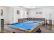 Bright game room features a stylish pool table and inviting decor at 7036 E Sheena Dr, Scottsdale, AZ 85254