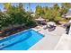 Aerial view of the backyard features pool, lounge chairs, gazebo and outdoor dining at 7036 E Sheena Dr, Scottsdale, AZ 85254