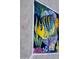 Close-up of the tile mural of a yellow and blue striped fish, adding to the beachy aesthetic at 7202 N 16Th Dr, Phoenix, AZ 85021