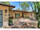 Charming front porch with exposed beams, brick accents, and comfortable seating areas at 7202 N 16Th Dr, Phoenix, AZ 85021