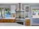 Modern kitchen featuring stainless steel appliances, stylish backsplash, and ample counter space, perfect for cooking and entertaining at 7202 N 16Th Dr, Phoenix, AZ 85021