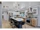 Spacious kitchen features a large island with seating, stainless steel appliances, and designer backsplash at 7202 N 16Th Dr, Phoenix, AZ 85021