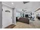 Inviting living room with tile floors, neutral colors, and a view of the front entry at 7202 N 16Th Dr, Phoenix, AZ 85021