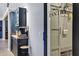 View into a pantry with storage, shelving, and a modern sliding door at 7202 N 16Th Dr, Phoenix, AZ 85021