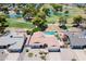 Beautiful aerial view of a home with a private pool and golf course access, perfect for outdoor living at 7318 S Mcallister Ave, Tempe, AZ 85283