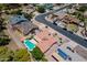 An aerial view featuring home with pool in a residential community and streets with vehicle traffic at 7318 S Mcallister Ave, Tempe, AZ 85283