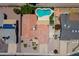 Detailed aerial view of the home with a private pool, neat yard, and adjacent community at 7318 S Mcallister Ave, Tempe, AZ 85283