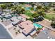 Lovely aerial shot of a home with a backyard pool, near lush green golf course and mature landscaping at 7318 S Mcallister Ave, Tempe, AZ 85283