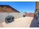 Private backyard with concrete patio, block fence, and view of blue sky at 7318 S Mcallister Ave, Tempe, AZ 85283