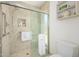Elegant bathroom showcasing a glass-enclosed shower with tile surround and a built-in niche at 7318 S Mcallister Ave, Tempe, AZ 85283