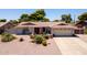 Charming single-story home with desert landscaping, a two-car garage, and a welcoming front entrance at 7318 S Mcallister Ave, Tempe, AZ 85283