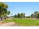 Picturesque golf course view featuring mature trees and a clear blue sky at 7318 S Mcallister Ave, Tempe, AZ 85283